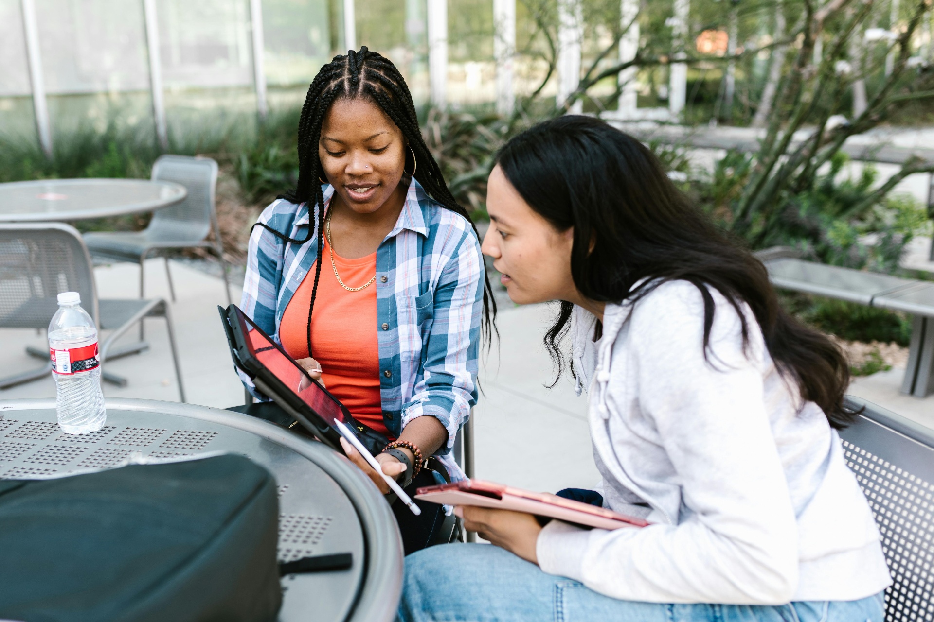Two students reviewing visa application together
